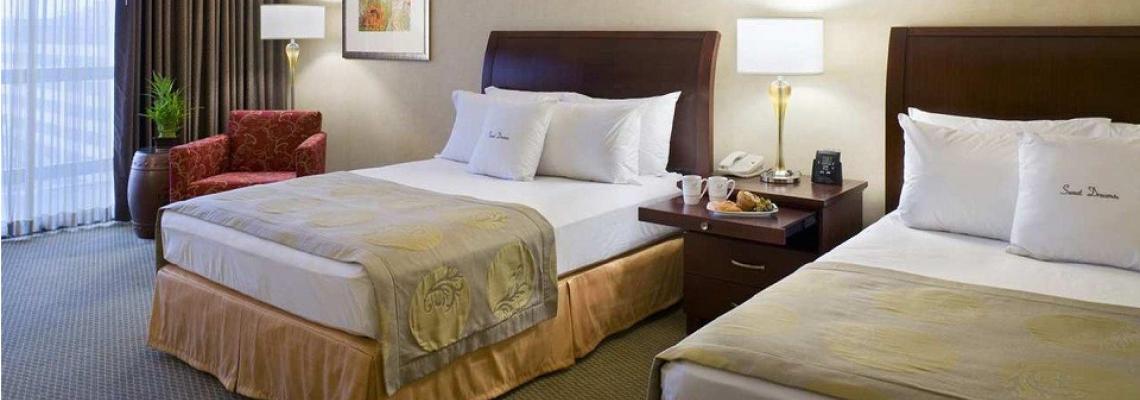 A double queen room at the DoubleTree